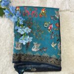 Multi Colour Kalamkari Printed Dola Crepe Saree